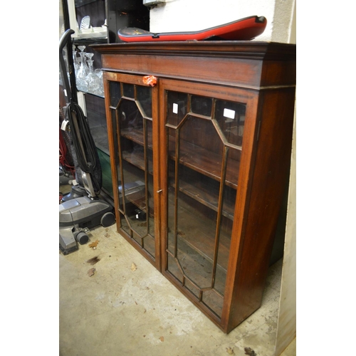 216 - A mahogany bookcase top.