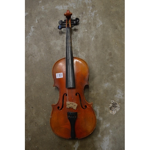 233 - A cased violin.