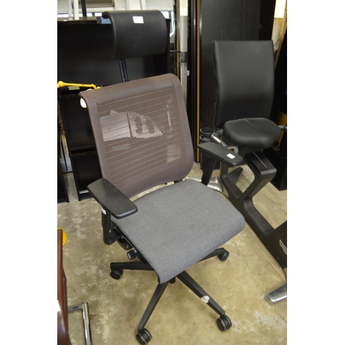 249 - A stylish swivel office chair.