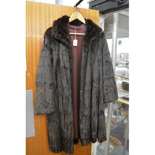 255 - A ladies fur coat.