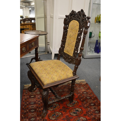 261 - Carved walnut high back dining chair.