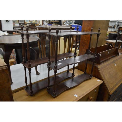 278 - A pair of mahogany wall shelves.