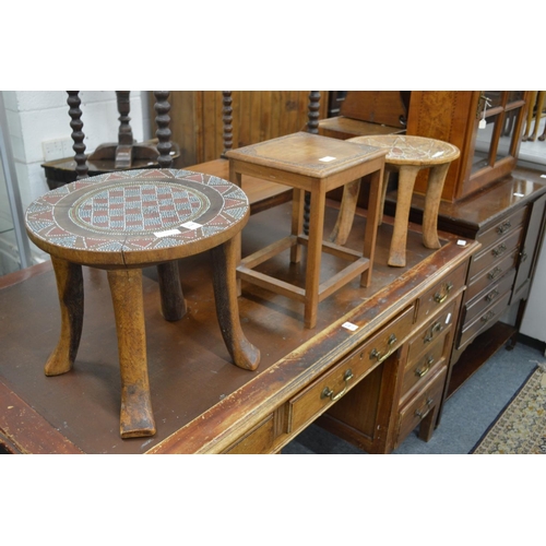 294 - Two African bead work decorated stools and another stool.