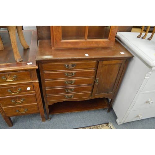 297 - An Edwardian mahogany music cabinet.