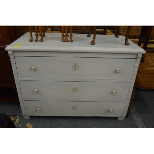 299 - A French painted three drawer chest.