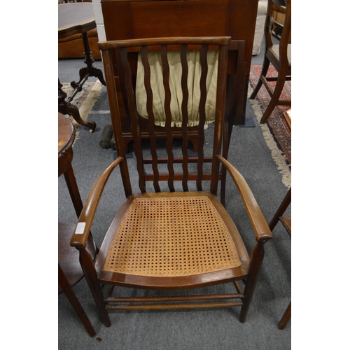 346 - Two mahogany occasional tables and a small armchair.