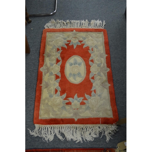 352 - A Bokhara rug, 160cm x 105cm together with two small rugs.