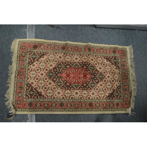 352 - A Bokhara rug, 160cm x 105cm together with two small rugs.