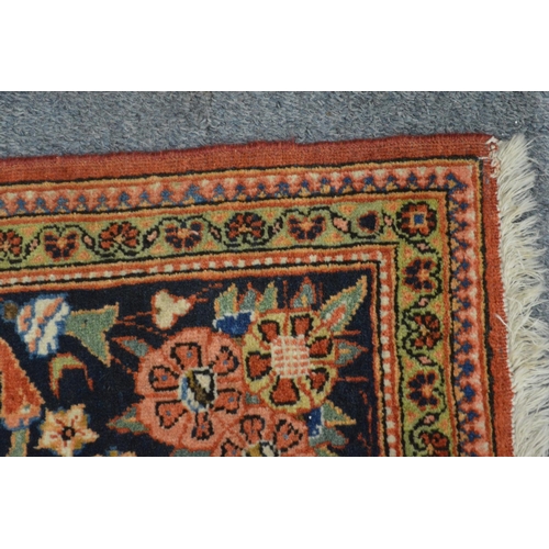 356 - A good Persian floral decorated carpet 220cm x 138cm.