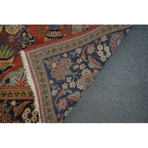 356 - A good Persian floral decorated carpet 220cm x 138cm.