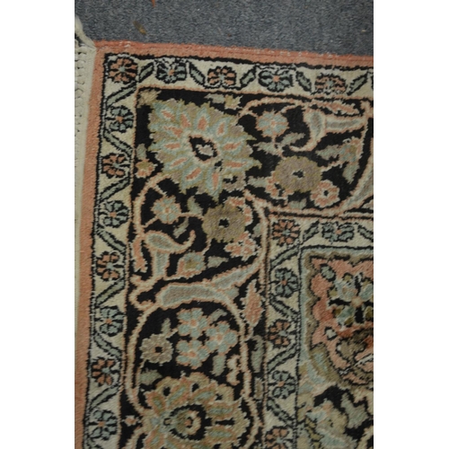 357 - A good Persian rug with floral decoration 180cm x 120cm.