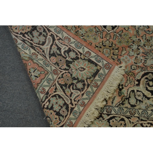 357 - A good Persian rug with floral decoration 180cm x 120cm.