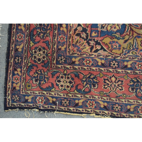 367 - A Persian carpet, blue ground with floral decoration 270cm x 150cm.