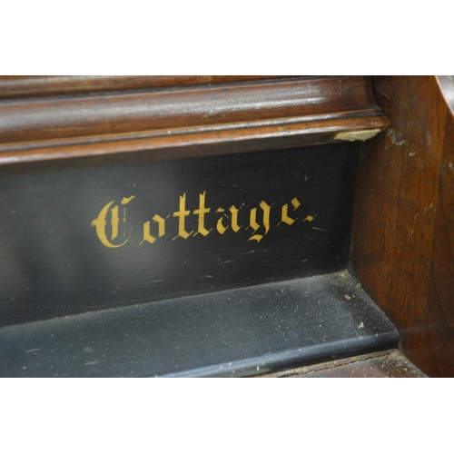 386 - A Victorian walnut cased organ manufactured by The Gable Company, Chicago, USA.