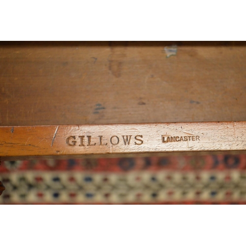 389 - Gillows of Lancaster, a good mahogany two drawer writing table.