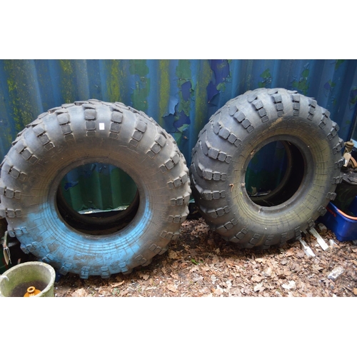 44 - Two large tyres.