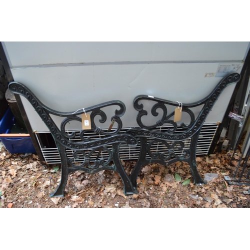 46 - A pair of cast iron bench ends.