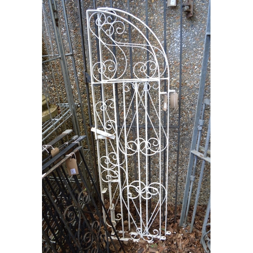 48 - A pair of white painted wrought iron arch topped gates, combined size 156cm high x 82cm wide excludi... 