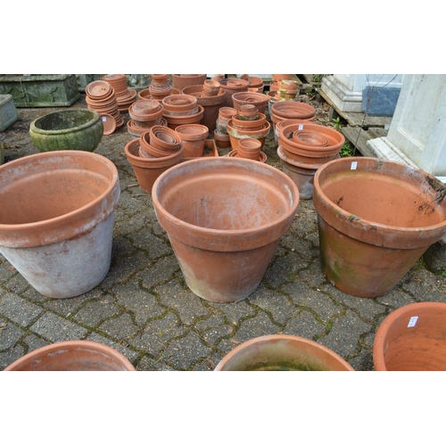 5 - Three large terracotta plant pots.