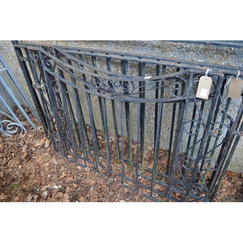 52 - A pair of black painted wrought iron driveway gates each measuring 93cm high x 116cm wide.