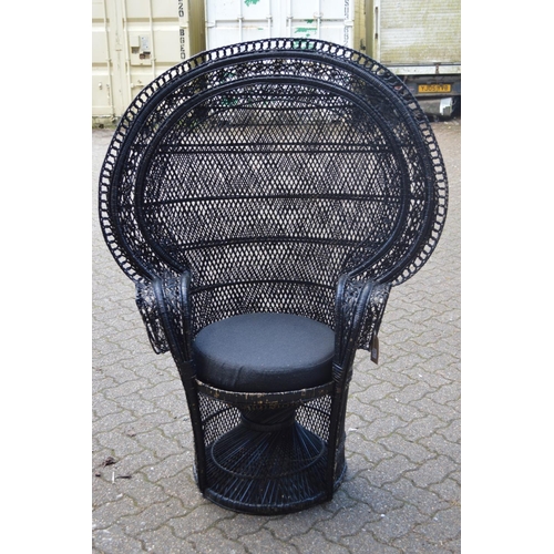 58 - A wicker peacock chair.