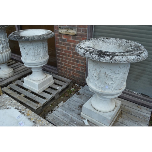 62 - A good pair of carved Italian white marble Campagna urns on stands, the urns 92cm high, the pedestal... 