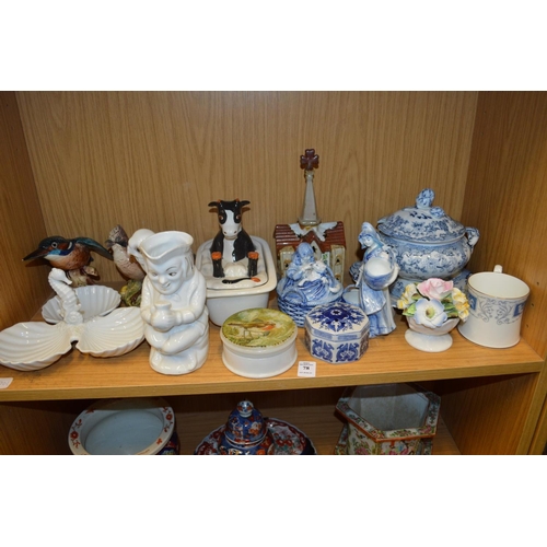 78 - A shelf of decorative china.