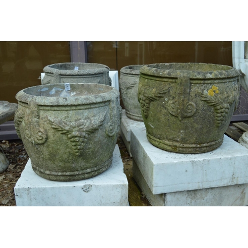 8 - A pair of composite garden planters.