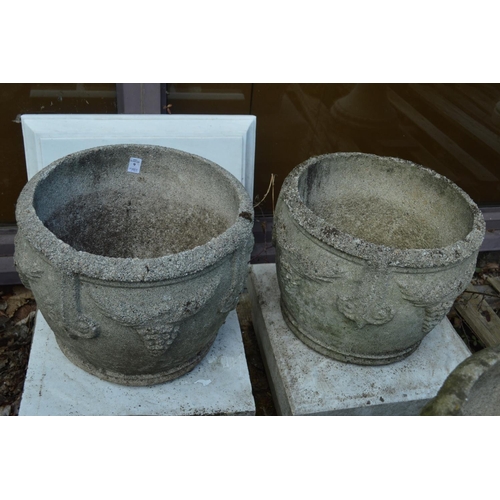 9 - A pair of composite garden planters.