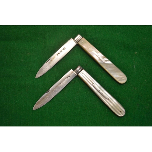 904 - Two silver and mother-of-pearl folding fruit knives.