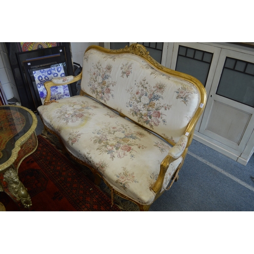 391 - A French style gilt framed and floral upholstered four piece salon suite comprising settee, armchair... 