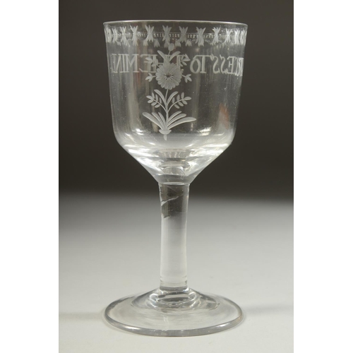 1068 - A LARGE 18TH CENTURY GLASS GOBLET, engraved 