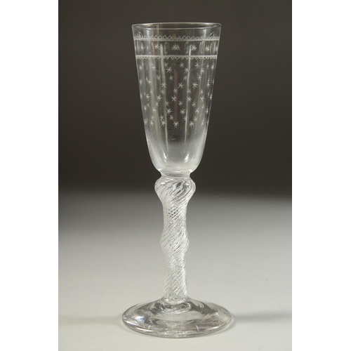 1071 - A GOOD 18TH CENTURY ENGLISH WINE GLASS the bowl engraved with stars, with air twist stem. 7.5ins hig... 