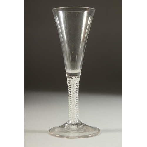 1072 - A GOOD 18TH CENTURY ENGLISH WINE GLASS with tapering bowl and white twist stem. 7.5ins