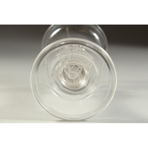 1081 - A LARGE 18TH CENTURY ENGLISH GLASS with circular bowl. 3.56ins diameter and moulded stem. 6.25ins hi... 