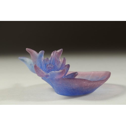 1094 - A SMALL DAUM BLUE GLASS FLOWERS AND LEAF. Signed, Daum, France. 3.25ins in original box.