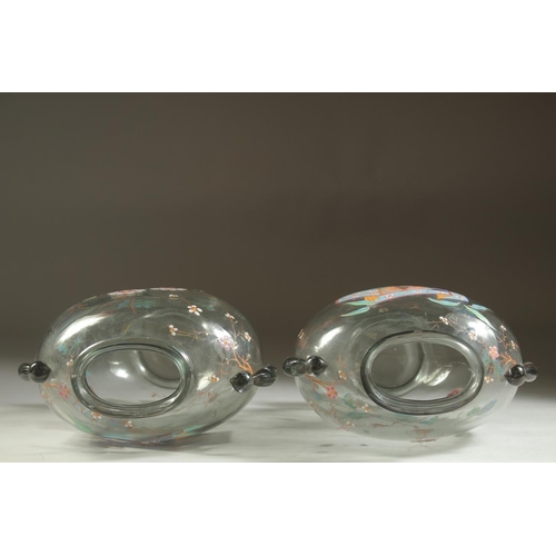 1099 - A GOOD PAIR OF ART DECO GLASS VASES with enamel decoration. 7ins high.