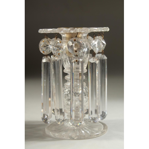 1104 - A GOOD PAIR OF REGENCY CUT GLASS LUSTRES with prism drops and circular bases. 5.5ins high.