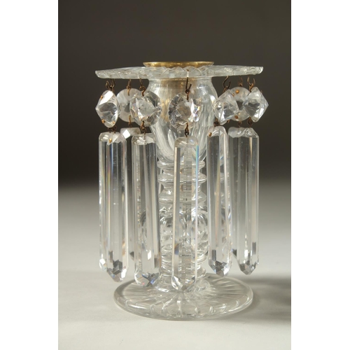 1104 - A GOOD PAIR OF REGENCY CUT GLASS LUSTRES with prism drops and circular bases. 5.5ins high.