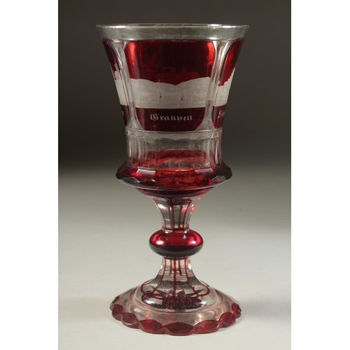 1106 - A GOOD BOHEMIAN RUBY GOBLET etched with four buildings. 8ins high and A PAIR OF BEAKERS 4ins high. (... 