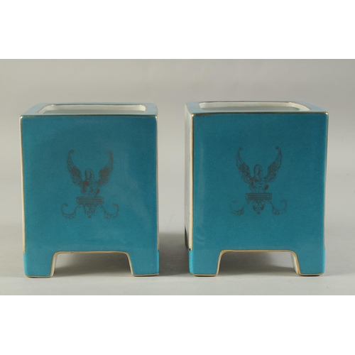 1156 - A PAIR OF BLUE SEVRES DESIGN SQUARE CACHES POTS with classical design panel. 7ins high.