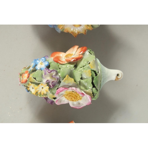 1160 - A GOOD SET OF SIX MEISSEN PORCELAIN FLOWER ENCRUSTED TREE DECORATIONS. 3.75ins long.