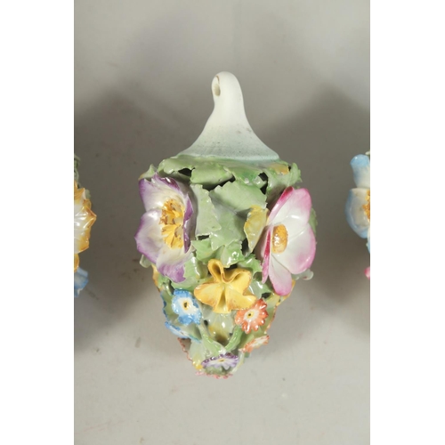 1160 - A GOOD SET OF SIX MEISSEN PORCELAIN FLOWER ENCRUSTED TREE DECORATIONS. 3.75ins long.