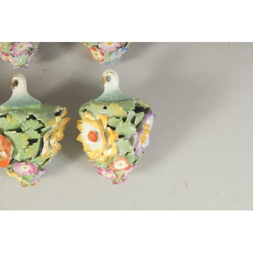 1164 - A GOOD SET OF NINE MEISSEN PORCELAIN FLOWER ENCRUSTED TREE DECORATIONS. 2.75ins long.