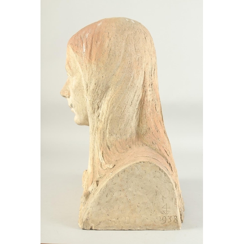 1166 - MARY STOURTON AN ART DECO TERRA COTTA BUST OF A YOUNG GIRL with long hair. Signed, Mary Stourton. 16... 