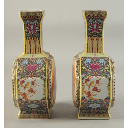 1177 - A PAIR OF CHINESE PORCELAIN OCTAGONAL VASES painted with birds. 10ins high.