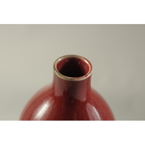 1187 - A CHINESE PORCELAIN RED DOUBLE GOURD VASE. 7.5ins high.