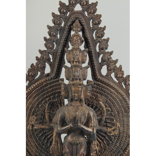 1199 - A BRONZE MULTI ARM DEITY. 16ins high.