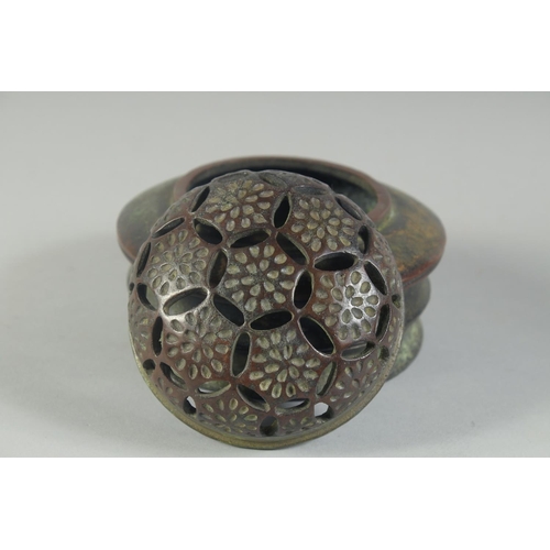 1200 - A CHINESE CIRCULAR BRONZE CENSER AND COVER. 4.5ins diameter.