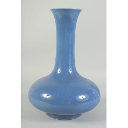 1201 - A CHINESE PORCELAIN BLUE BULBOUS VASE. 13ins high.